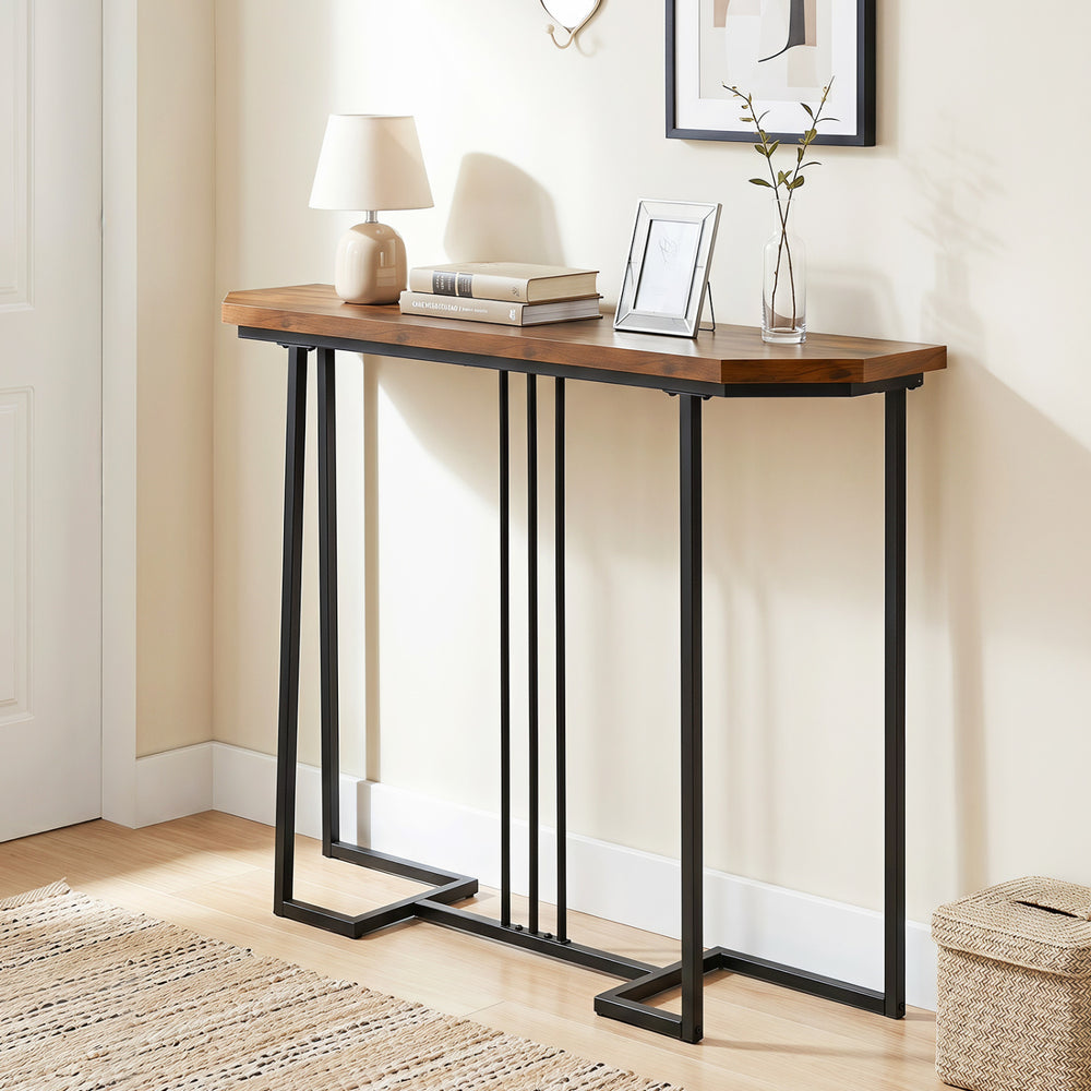 Narrow entryway console table with rustic brown top and metal legs, perfect for hallways and behind sofas.