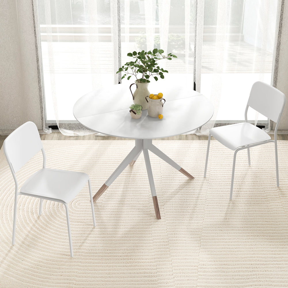 Modern white dining table with two chairs, featuring a sturdy metal frame and an inclined backrest for comfort.