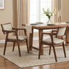 Set of 2 modern rubber wood dining chairs with beige fabric upholstery, featuring ergonomic support and smooth armrests.