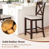 Modern farmhouse counter height stool in walnut with solid rubber wood, cushioned seat, and footrest for comfort.