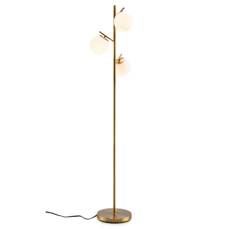 Three-globe floor lamp with a gold finish and sturdy base, perfect for modern living room decor.