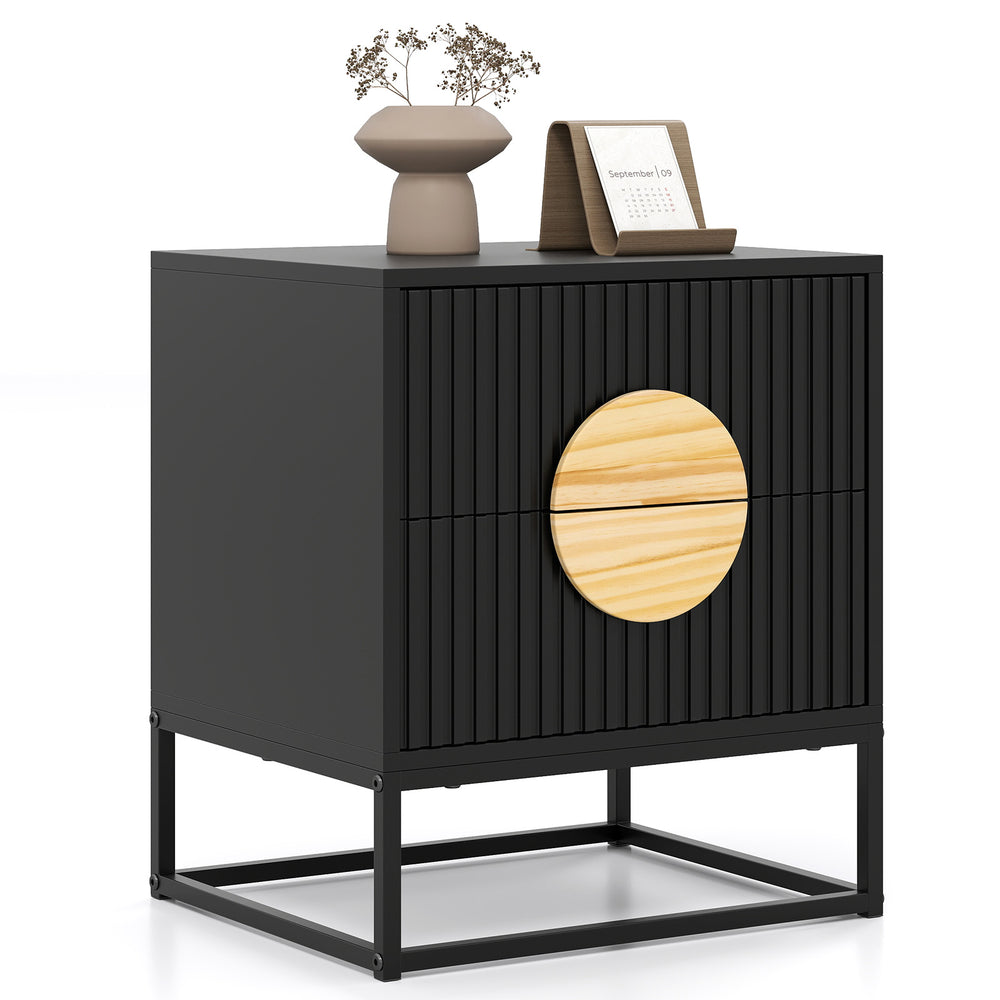 Modern black nightstand with fluted design, two drawers, and pine wood handles for versatile bedroom storage.