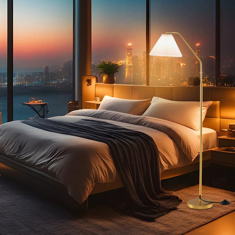 Modern standing lamp with pleated lampshade and adjustable head, perfect for elegant bedroom lighting.