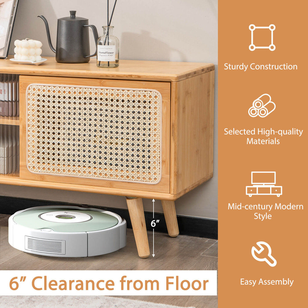 Modern TV stand with rattan sliding doors, bamboo construction, and 6" floor clearance for stylish storage and.