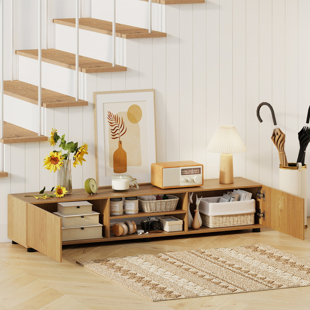 Modern TV stand in natural finish with open shelves and side cabinets, perfect for organizing entertainment essentials.