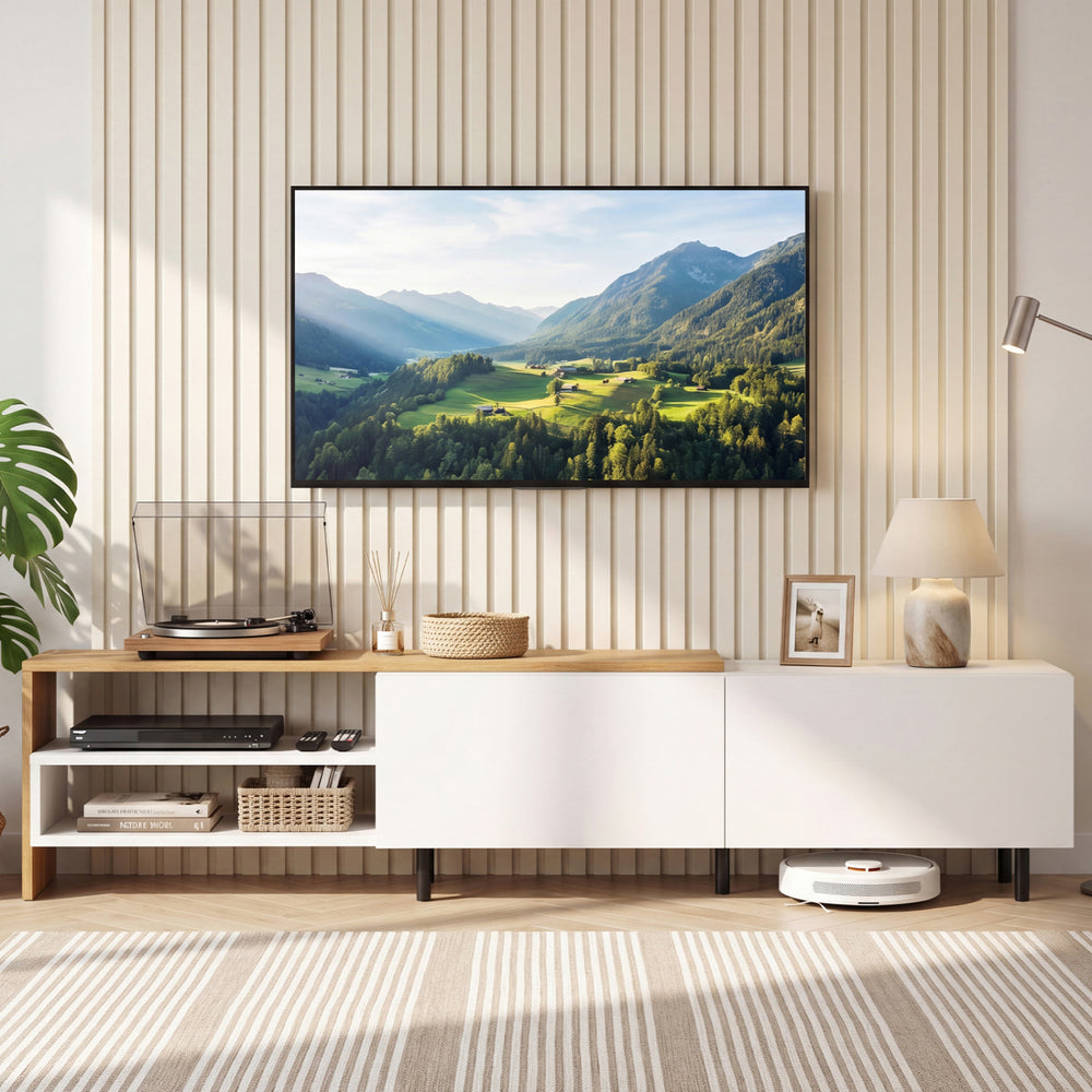 Modern TV stand in white for 80-inch TVs featuring storage shelves and cabinets, styled in a contemporary living room.