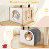 Modern tall cat tower featuring dual condos, sisal carpets, and dangling balls for playful feline fun.