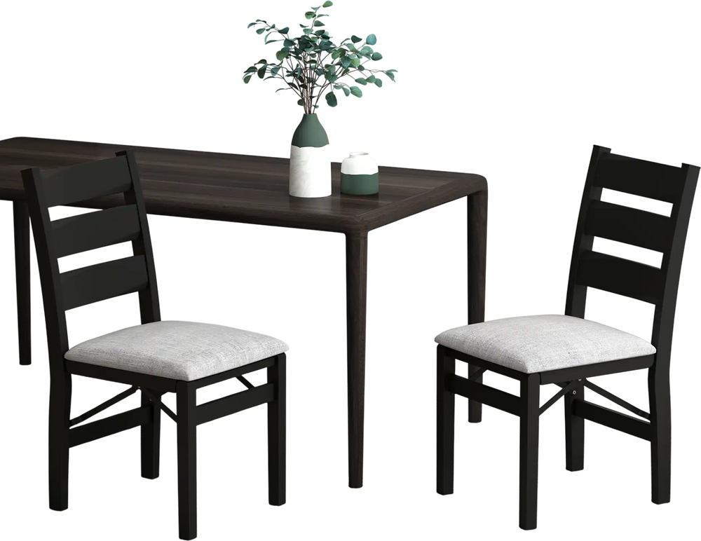 Set of 2 black folding chairs with cushioned seats and ergonomic backrests, ideal for dining rooms and gatherings.