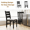 Black modern upholstered folding chair set with comfy backrest, perfect for dining rooms and easy storage.