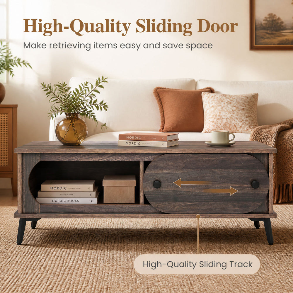 Modern wooden center table in walnut with sliding door, featuring two compartments and sturdy metal legs for living room storage.