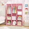 Modular pink baby wardrobe with 10 cubes, hanging rod, and shelves for organized storage in nurseries or playrooms.