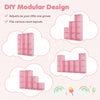 Modular pink baby wardrobe with 10 cubes and hanging rod, designed for flexible storage in nurseries and playrooms.