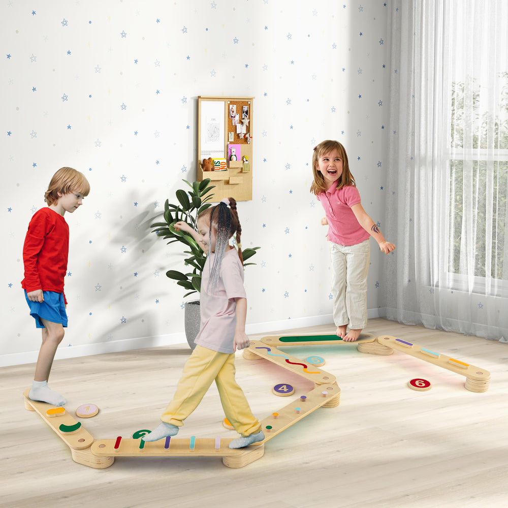Montessori balance beam set with wooden stepping stones, promoting motor skills and imaginative play for kids.