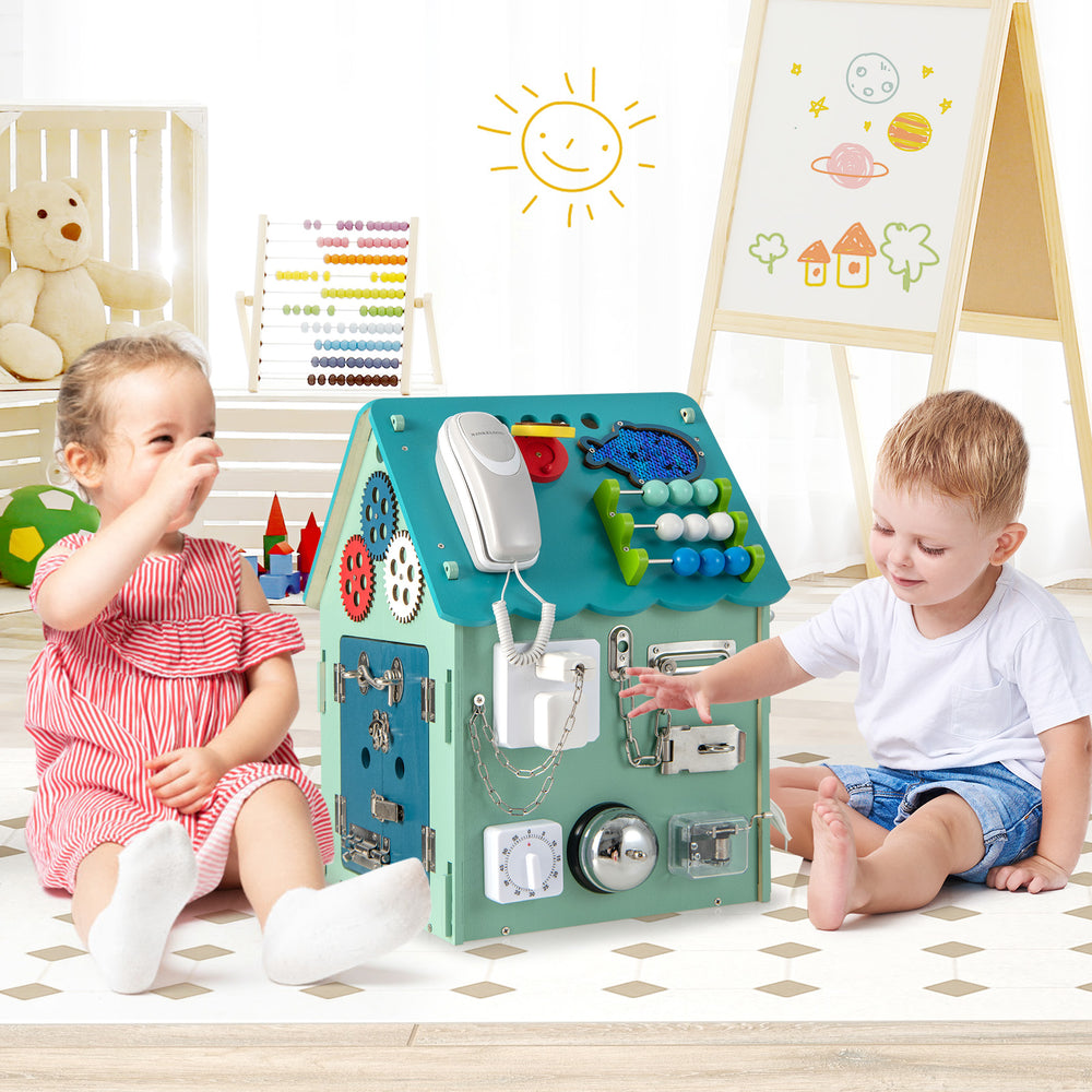 Montessori play house with sensory games in blue, featuring storage space and various life skill activities for kids.