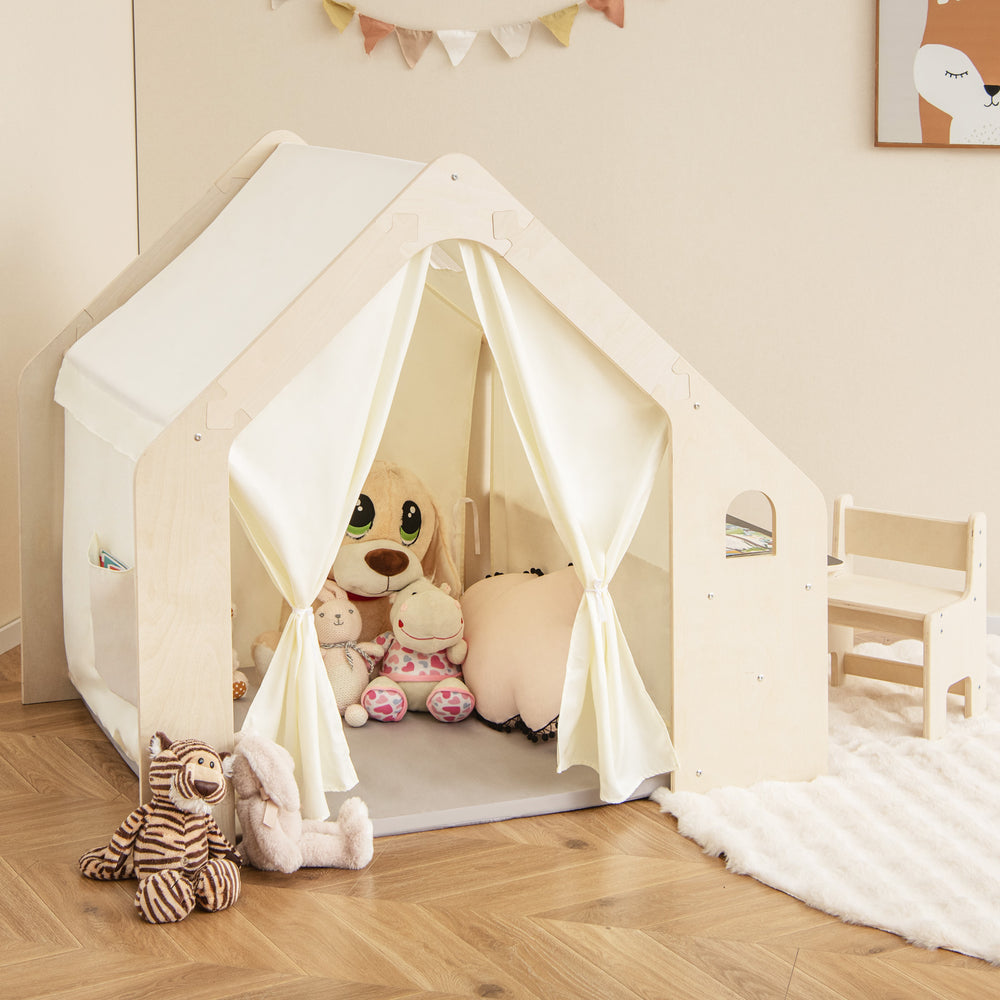 Montessori style indoor playhouse in beige with storage bin, featuring a comfortable mat and blackboard for toddlers.