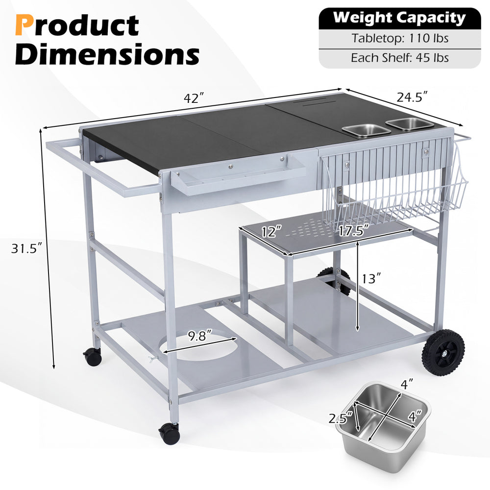 Movable grill table with spacious black tabletop, stainless steel condiment caddies, and wheels for easy outdoor use.