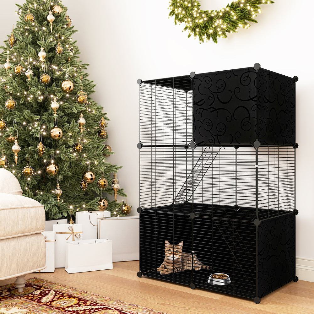 Multi-level cat tower in black with 2-door condo, hammock, and climbing platforms for playful exploration and.