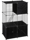 Multi-level cat tower in black featuring a 2-door condo, hammock, and climbing platforms for exploration and relaxation.