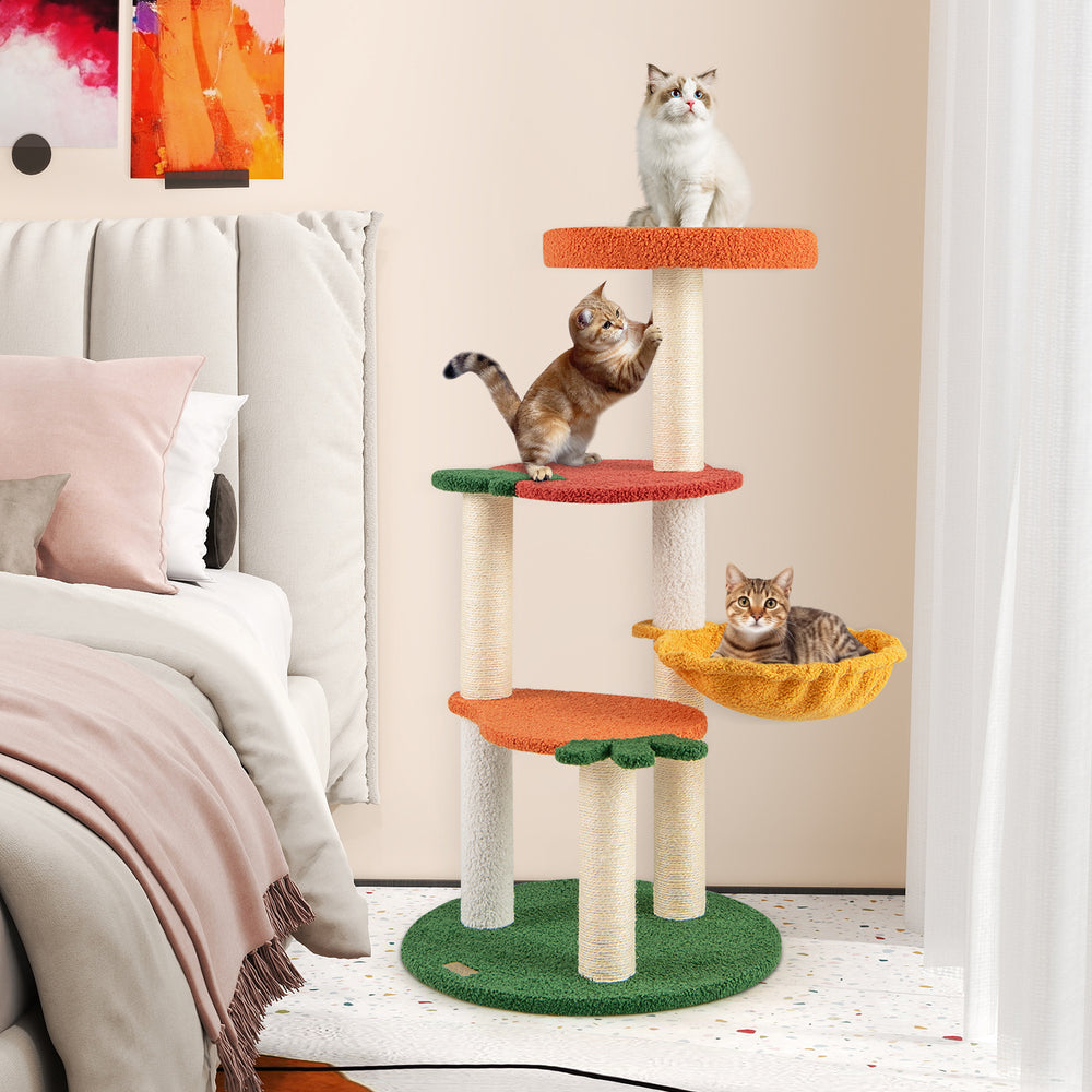 Multi-level cat tree with fruit-shaped platforms in red and orange, showcasing a cozy side basket for kittens to relax.