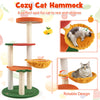 Multi-level cat tree with fruit-shaped platforms in red and orange, featuring a cozy rotatable hammock for resting.
