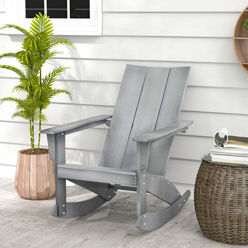 Gray Adirondack rocking chair with a spacious seat and sturdy HDPE build, ideal for comfortable balcony lounging.