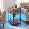 Narrow side table with charging station, LED lights, and hidden storage, perfect for small spaces and device.