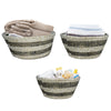 Set of 3 natural canes grass baskets with hollowed handles, ideal for stylish storage and organization in any room.