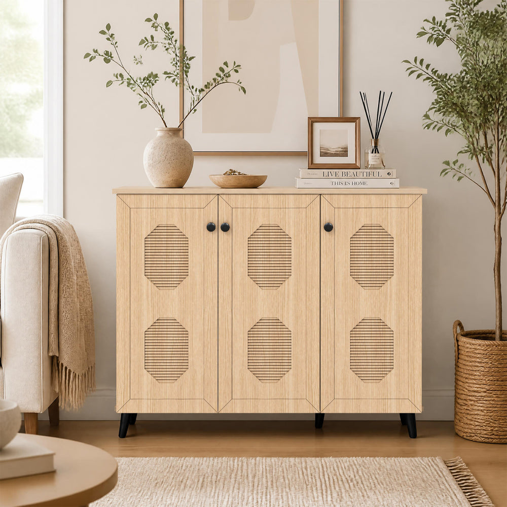 Natural shoe cabinet with three doors, featuring hollow out panels and ample storage for footwear in entryway or hallway.
