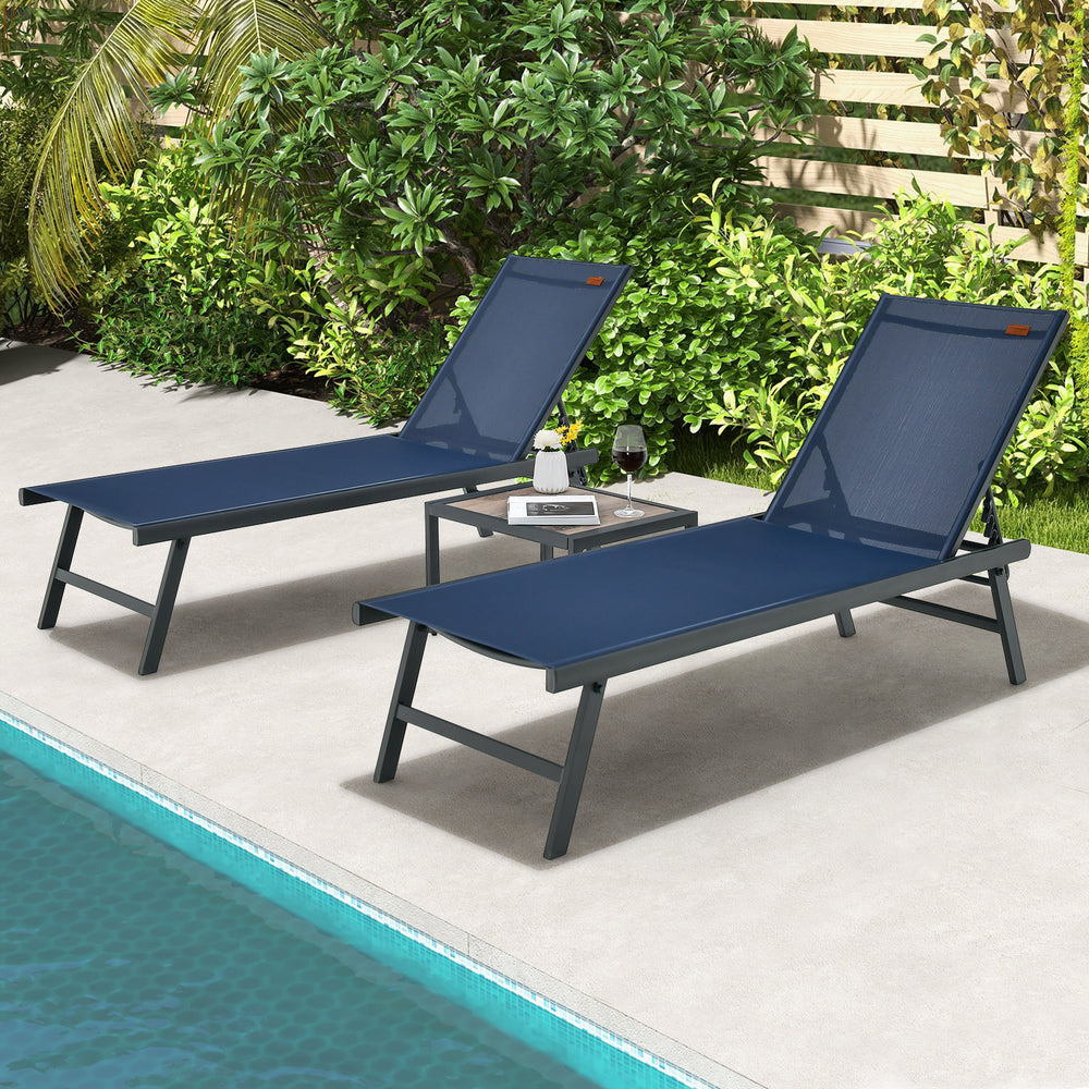Navy 3-piece patio chaise lounge chair and table set with adjustable backrest for poolside relaxation.