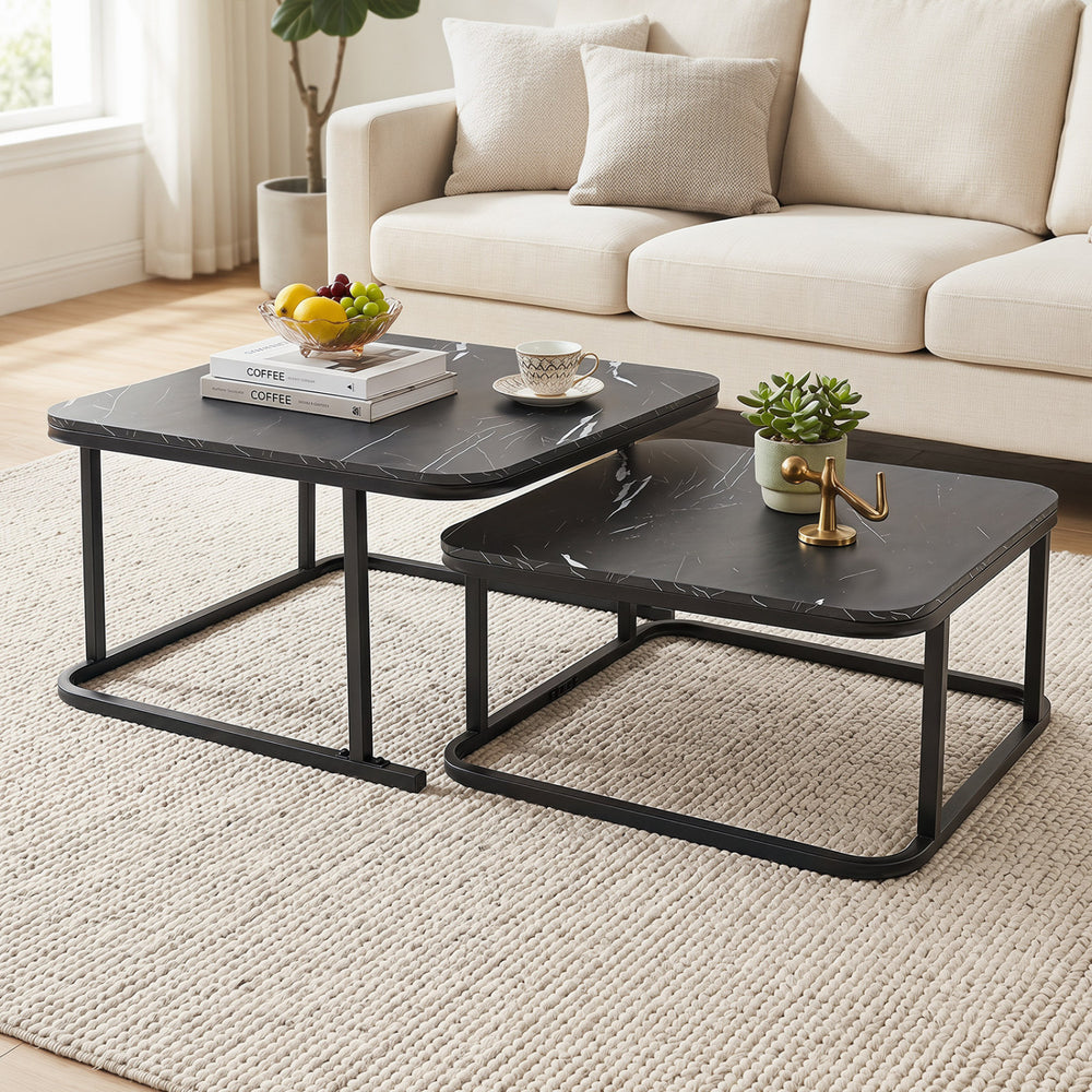 Nesting coffee table set of 2 showcases a sleek black faux marble top with a sturdy metal frame for stylish decor.