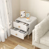 White nightstand with two drawers, solid rubber wood legs, showcasing mid-century design for stylish bedroom storage.