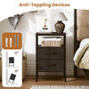 Modern black nightstand with two fabric drawers, charging station, and anti-toppling devices for safety and stability.