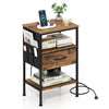 Rustic brown nightstand with charging station showcasing a fabric drawer, side pocket, and wide tabletop for versatile.