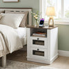 Nightstand with rustic brown top features a built-in charging station and two drawers for convenient bedroom storage.