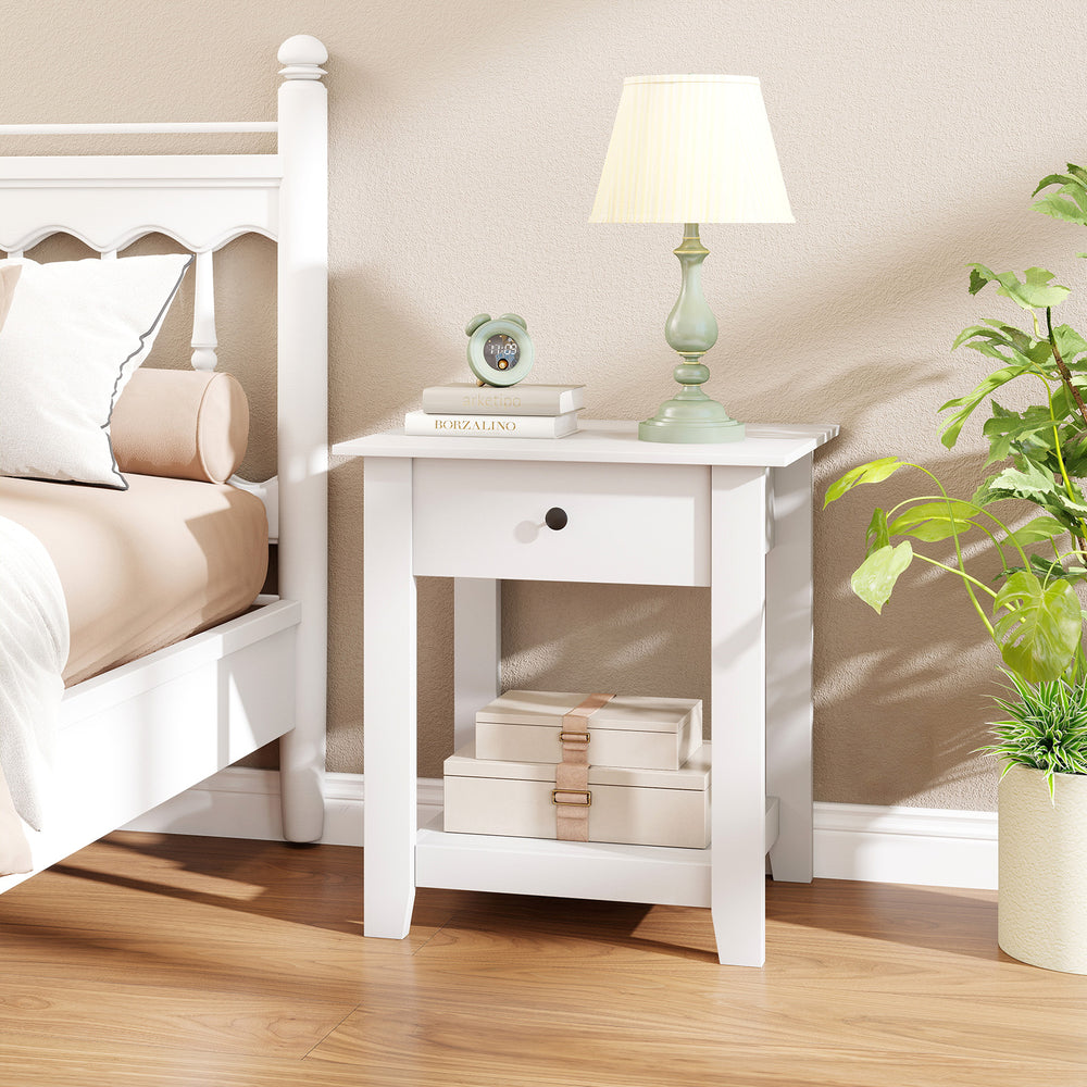 White nightstand with drawer and open shelf, perfect for bedside storage in modern bedrooms.
