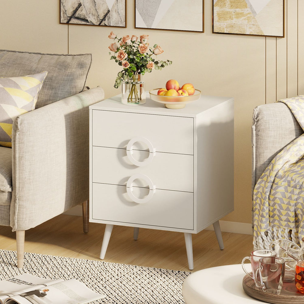 Stylish nightstand in white showcases a wide tabletop and spacious drawers, perfect for bedside organization and decor.