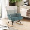Nursery rocking chair with a gentle rocking motion, ergonomic design, and cozy boucle fabric, ideal for relaxation in.