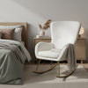 White nursery rocking chair with curved backrest and armrests, featuring teddy fleece cover and electroplated metal.