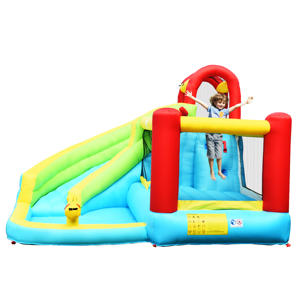 Inflatable bounce house with climbing wall, water slide, and basketball hoop, perfect for summer backyard fun.
