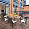 Patio wicker dining armchair set featuring ergonomic design and soft zippered cushions, ideal for outdoor dining.