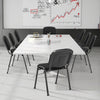Conference room featuring a set of two office chairs with padded cushions and metal frames, designed for ergonomic.