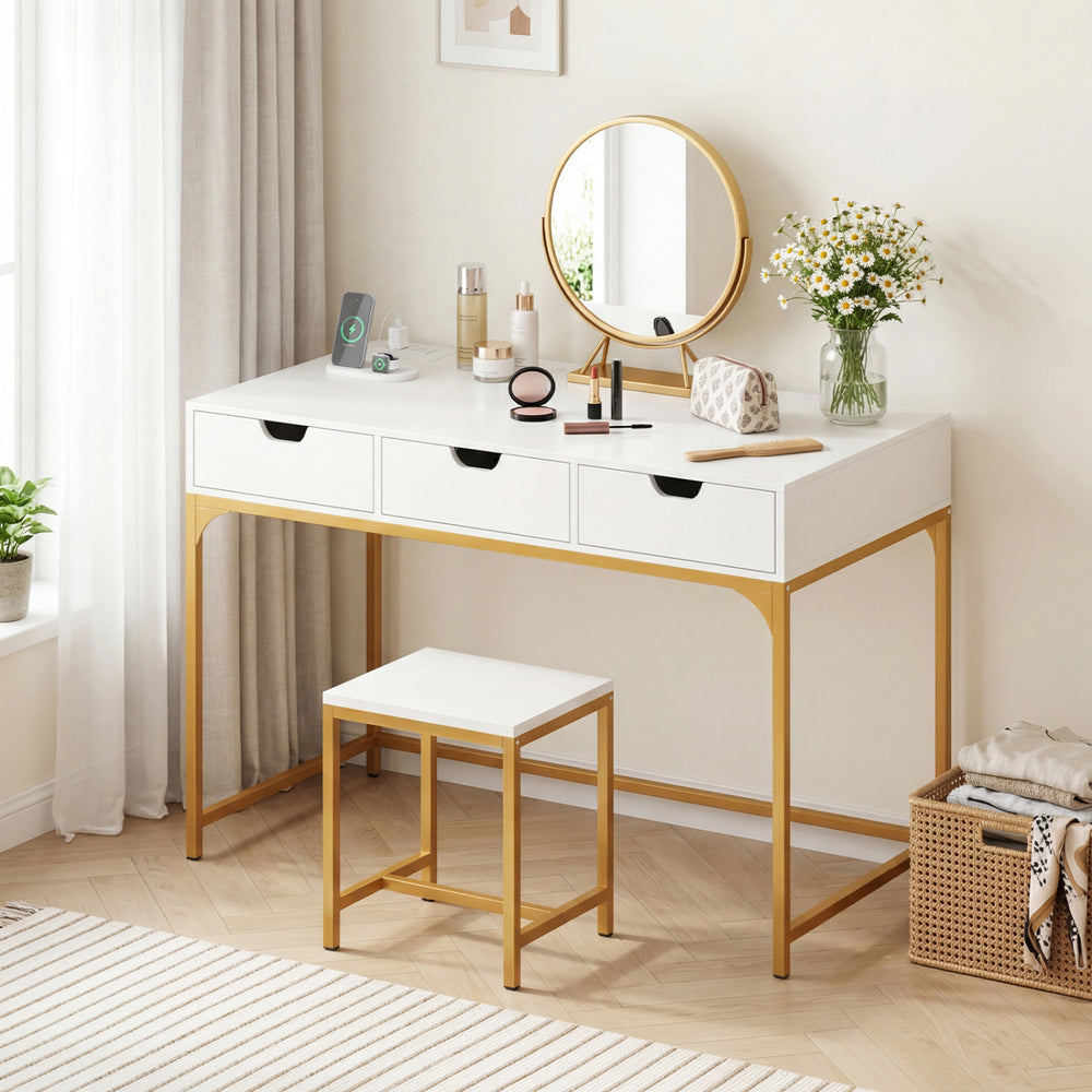 White office desk with gold metal legs, featuring three drawers and a hidden compartment for convenient storage.