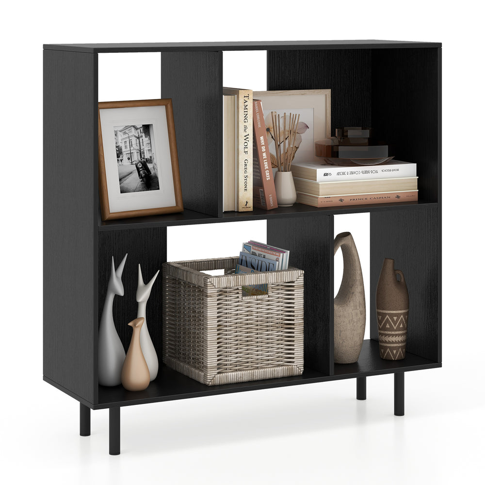 Open shelf bookcase in black with 4 compartments, featuring decorative items and sturdy metal legs for stability.