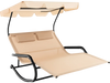 Beige outdoor rocking chaise lounge with a sturdy metal frame and gentle rocking design, ideal for backyard relaxation.