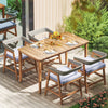 Outdoor acacia wood dining set featuring four wicker chairs with gray cushions, perfect for backyard relaxation.