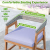 Outdoor acacia wood dining chair with gray seat cushion, featuring a wrap-around backrest for enhanced comfort.