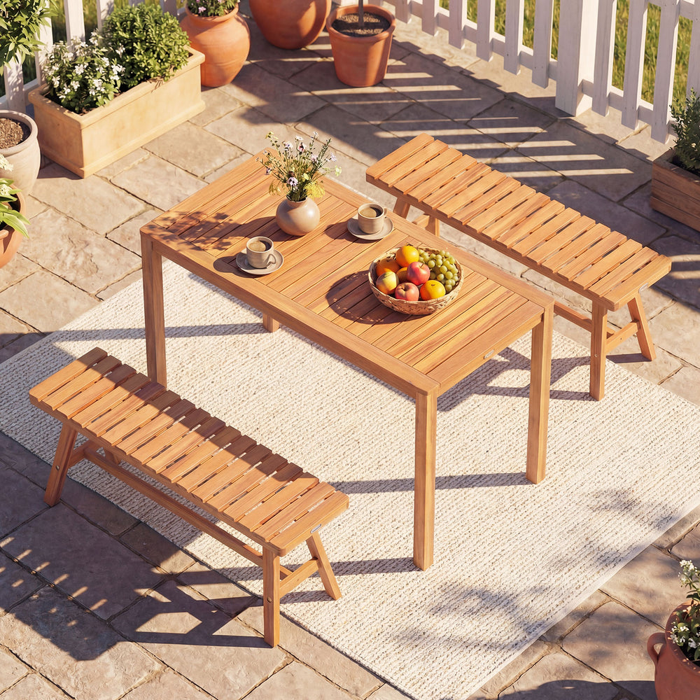 Outdoor acacia wood dining table with slatted tabletop, seating 4-6, perfect for patio or garden use.