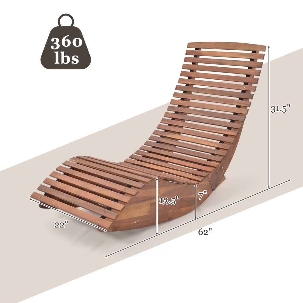 Outdoor acacia wood rocking chair with slatted seat and high back, designed for backyard and patio relaxation.
