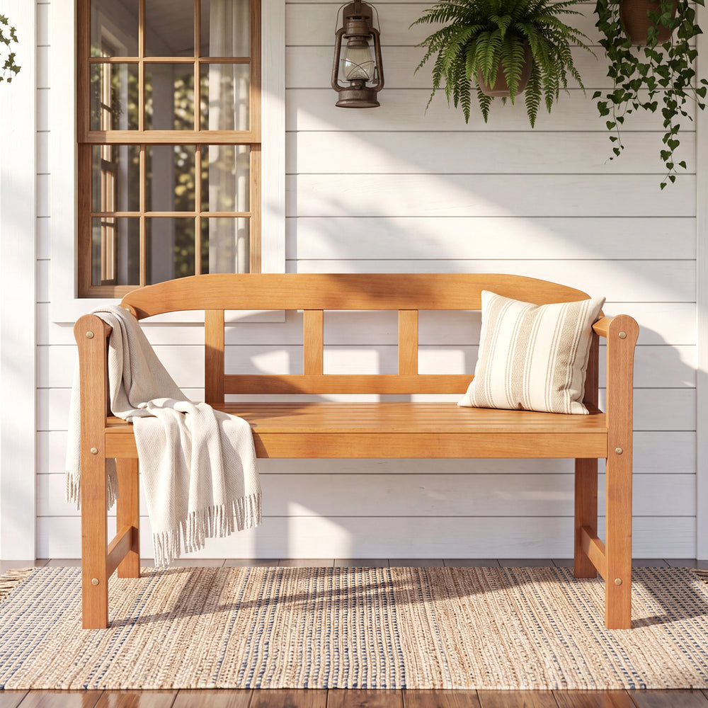 Acacia wood 2-seater garden bench with backrest and angled armrests, perfect for porch or backyard relaxation.