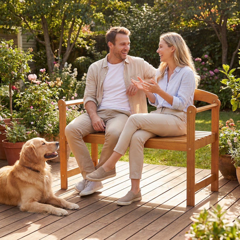 Acacia wood 2-seater patio loveseat with angled armrests, perfect for outdoor relaxation on the porch or backyard.
